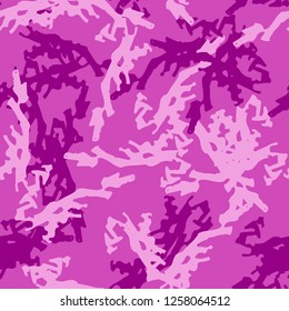 UFO camouflage of various shades of pink and purple colors. It is a colorful seamless pattern that can be used as a camo print for clothing and background and backdrop or computer wallpaper