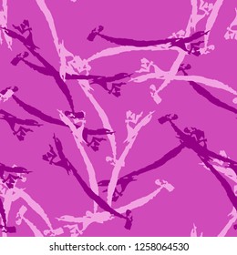 UFO camouflage of various shades of pink and purple colors. It is a colorful seamless pattern that can be used as a camo print for clothing and background and backdrop or computer wallpaper