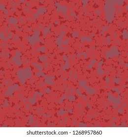 UFO camouflage of various shades of red, pink and purple colors. It is a colorful seamless pattern that can be used as a camo print for clothing and background and backdrop or computer wallpaper