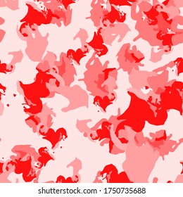 UFO camouflage of various shades of red and pink colors. It is a colorful seamless pattern that can be used as a camo print for clothing and background and backdrop or computer wallpaper