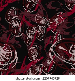 UFO camouflage of various shades of red, black and pink colors. It is a colorful seamless pattern that can be used as a camo print for clothing and background and backdrop or computer wallpaper
