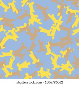 UFO camouflage of various shades of yellow, brown and blue colors. It is a colorful seamless pattern that can be used as a camo print for clothing and background and backdrop or computer wallpaper
