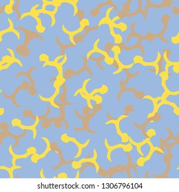 UFO camouflage of various shades of yellow, brown and blue colors. It is a colorful seamless pattern that can be used as a camo print for clothing and background and backdrop or computer wallpaper