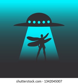 UFO and extraterrestrial alien young woman silhouette with wings of dragonfly