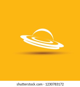 Ufo flying saucer vector icon isolated on orange background. Ufo logo design template