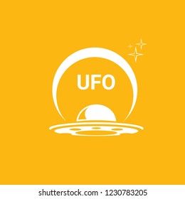 Ufo flying saucer vector icon isolated on orange background. Ufo logo design template