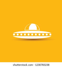 Ufo flying saucer vector icon isolated on orange background. Ufo logo design template