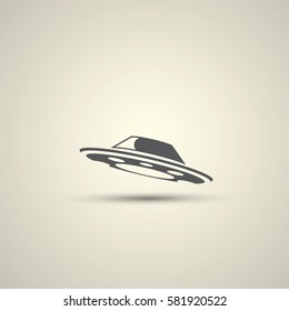 Ufo flying saucer vector icon isolated on background. Ufo logo design template