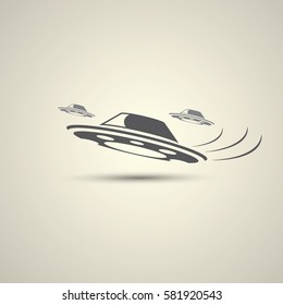 Ufo flying saucer vector icon isolated on background. Ufo logo design template