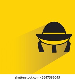 Ícone de OVNI com fundo amarelo-sombra