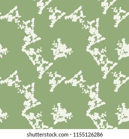 UFO military camouflage seamless pattern in green and beige colors. Seamless repeat camo pattern, usable as spring or summer camoflauge urban print, background, paintball or strikeball masking