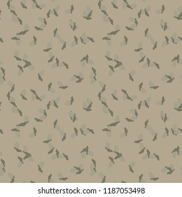 UFO military camouflage seamless pattern in different shades of beige and green colors. Seamless repeat forest or desert camo pattern, urban camoflauge, background, paintball or strikeball print