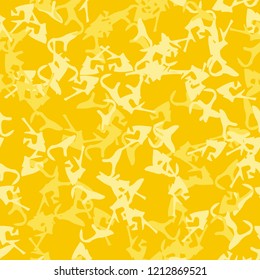 UFO military camouflage seamless pattern in different shades of yellow color. Seamless repeat camo pattern, fashion urban camoflauge, background, bright paintball or strikeball print