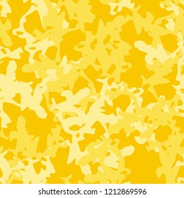 UFO military camouflage seamless pattern in different shades of yellow color. Seamless repeat camo pattern, fashion urban camoflauge, background, bright paintball or strikeball print