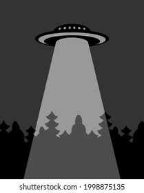 UFO over forest. Flying saucer flies over forest