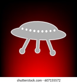 UFO simple sign. Postage stam or old photo style on red-black gradient background.