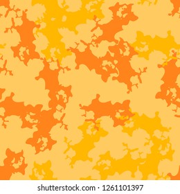 UFO urban camouflage of various shades of orange and yellow colors. It is a colorful seamless pattern that can be used as a camo print for clothing and background and backdrop or computer wallpaper