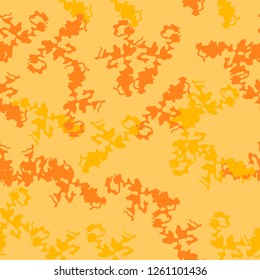 UFO urban camouflage of various shades of orange and yellow colors. It is a colorful seamless pattern that can be used as a camo print for clothing and background and backdrop or computer wallpaper