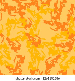 UFO urban camouflage of various shades of orange and yellow colors. It is a colorful seamless pattern that can be used as a camo print for clothing and background and backdrop or computer wallpaper