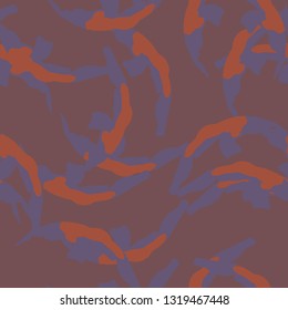 UFO urban camouflage of various shades of red, orange and purple colors. It is a colorful seamless pattern that can be used as a camo print for clothing and background and backdrop or wallpaper