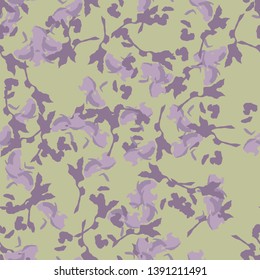 UFO urban camouflage of various shades of green and violet colors. It is a colorful seamless pattern that can be used as a camo print for clothing and background and backdrop or computer wallpaper