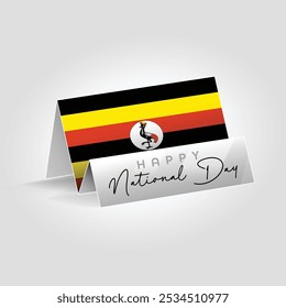 Uganda country paper flag standing on the ground. Happy national day flag design.