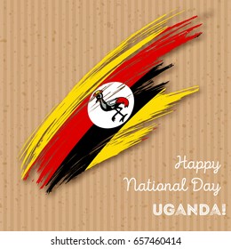 Uganda Independence Day Patriotic Design. Expressive Brush Stroke in National Flag Colors on kraft paper background. Happy Independence Day Uganda Vector Greeting Card.