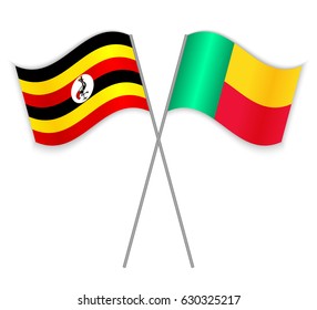 Ugandan and Beninese crossed flags. Uganda combined with Benin isolated on white. Language learning, international business or travel concept.