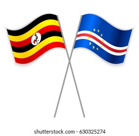 Ugandan and Cabo Verdean crossed flags. Uganda combined with Cabo Verde isolated on white. Language learning, international business or travel concept.