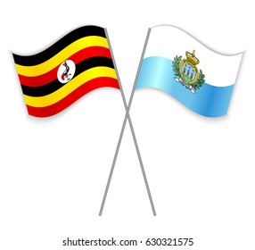 Ugandan and Sammarinese crossed flags. Uganda combined with San Marino isolated on white. Language learning, international business or travel concept.