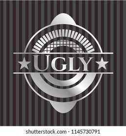 Ugly silver emblem