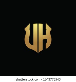 Monograma de logotipo UH con colores dorados y plantilla de diseño de forma de escudo