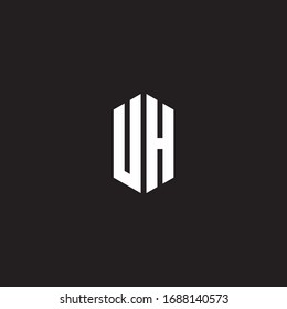 UH-Logo-Monogramm mit Design-Vorlage im Hexagon-Stil einzeln auf schwarzem Hintergrund