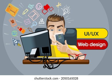 UI UX Web Designer, a guy with a phone in his hand in front of his computer, developing a web application.