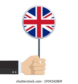 UK Circular Flag. Hand Holding Round British Flag. National Symbol Of Great Britain. Vector Illustration.