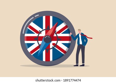 UK, United Kingdom economic direction after Brexit deal, business agreement and policy to drive England economy strategy concept, direction compass with Union Jack UK flag with businessman leader.