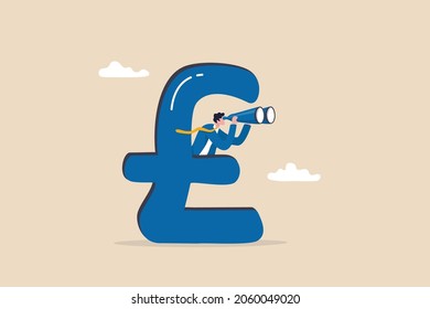 UK, United Kingdom economy forecast, financial or business visionary, England investment profit opportunity concept, businessman hiding behind large UK currency pound using binoculars to see future.