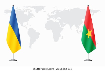 Die Flaggen der Ukraine und Burkina Fasos für offizielle Treffen vor dem Hintergrund der Weltkarte.