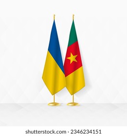 Ukraine and Cameroon flags on flag stand, illustration for diplomacy and other meeting between Ukraine and Cameroon. Vector illustration.