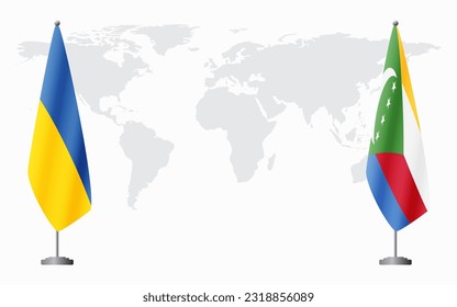 Ukraine and Comoros flags for official meeting against background of world map.