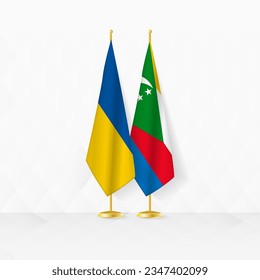 Ukraine and Comoros flags on flag stand, illustration for diplomacy and other meeting between Ukraine and Comoros. Vector illustration.