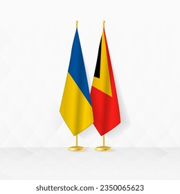 Ukraine and East Timor flags on flag stand, illustration for diplomacy and other meeting between Ukraine and East Timor. Vector illustration.