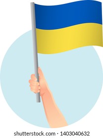 Ukraine flag in hand icon