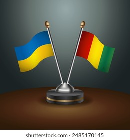 Bandera de Ucrania y Guinea juntas. Pequeño indicador de tabla con fondo degradado de color