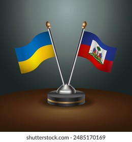 Ukraine and Haiti flag together. Small table flag with color gradient background