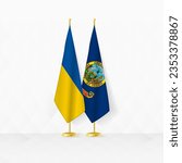 Ukraine and Idaho flags on flag stand, illustration for diplomacy and other meeting between Ukraine and Idaho. Vector illustration.