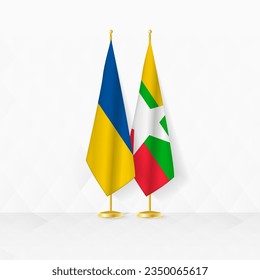 Ukraine and Myanmar flags on flag stand, illustration for diplomacy and other meeting between Ukraine and Myanmar. Vector illustration.