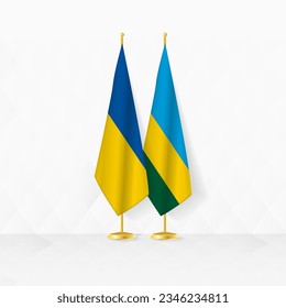 Banderas de Ucrania y Ruanda en el puesto de bandera, ilustración de la diplomacia y otra reunión entre Ucrania y Ruanda. Ilustración vectorial.