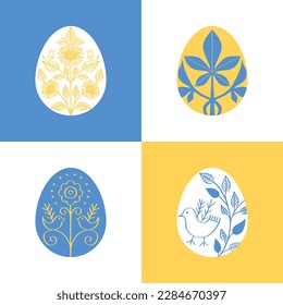 
Huevos de Pascua Ucranianos Patrón de adorno tradicional Pysanka pintado con colores nacionales ucranianos, azul y amarillo