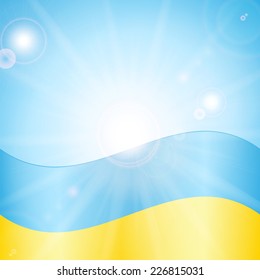Ukrainian flag on a background of sky and sun